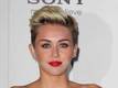 Miley Cyrus and Paris Hilton swatted... Miley Cyrus and Paris Hilton swatted...