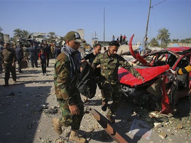 Suicide bomber kills dozens in Iraq