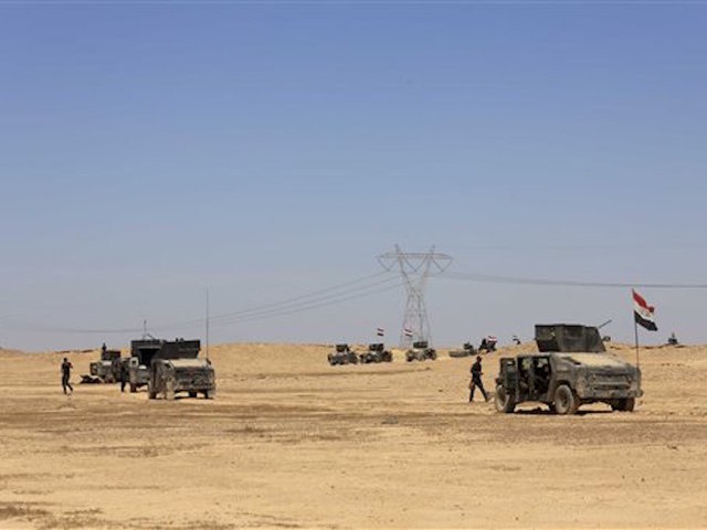 Iraqi forces face ISIS resistance in Hit