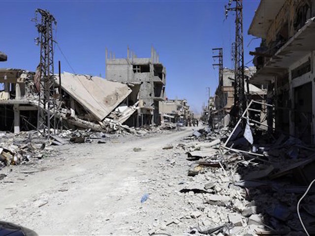 Clashes across northern Syria strain cease-fire