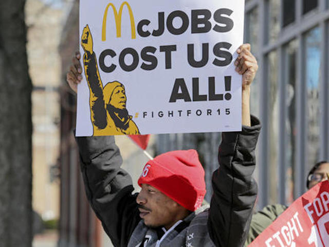 Protestors storm McDonald's across country