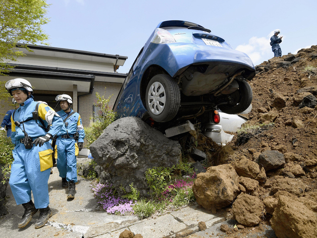 Twin quakes in Japan hit economy