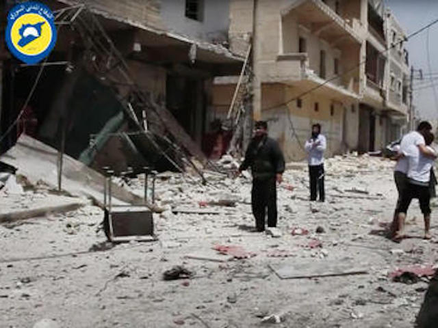 Airstrikes, shelling kill dozens in Syria