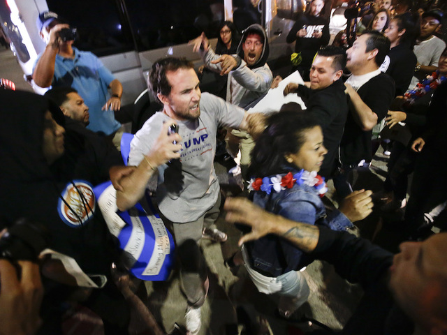 Protesters clash outside Trump rally in Calif.