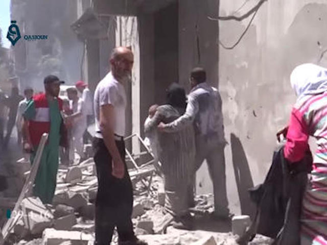 Activists say dozens killed in Syrian airstrike