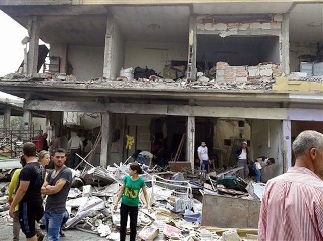 Activists: Insurgents seize village near Aleppo