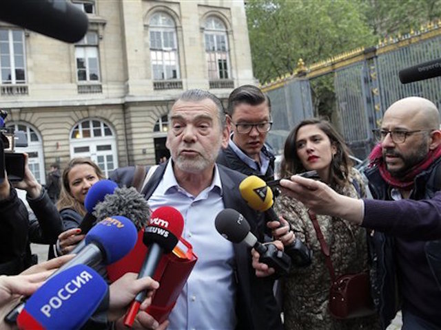 Paris attacks suspect stays silent
