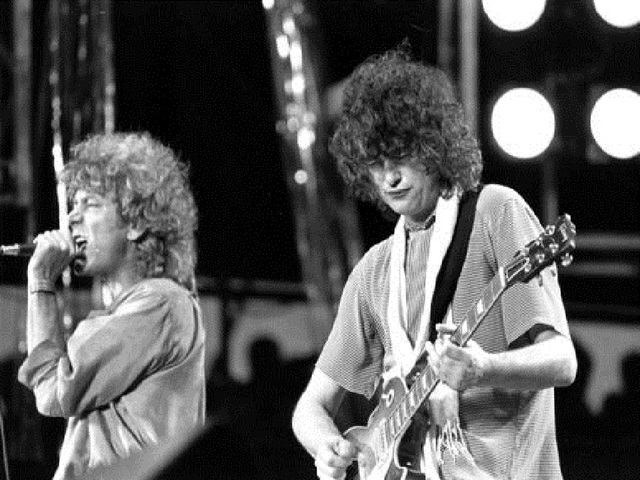 Led Zeppelin's Jimmy Page dodges court questions, riffs air guitar
