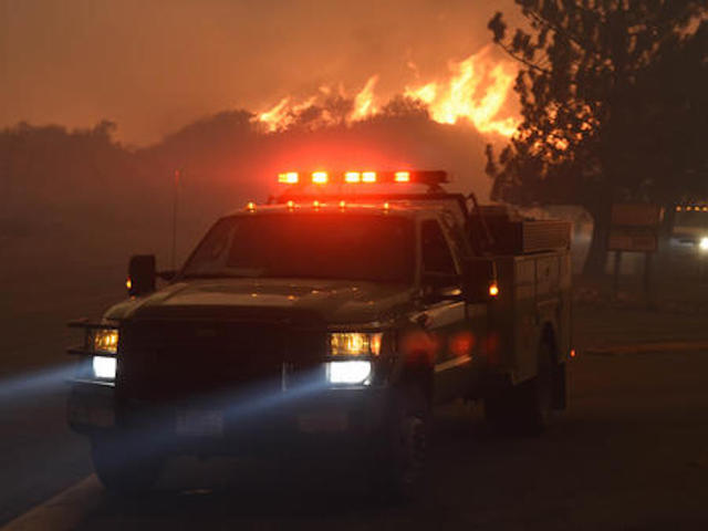 Southern California wildfire claims 18 homes, thousands more in danger