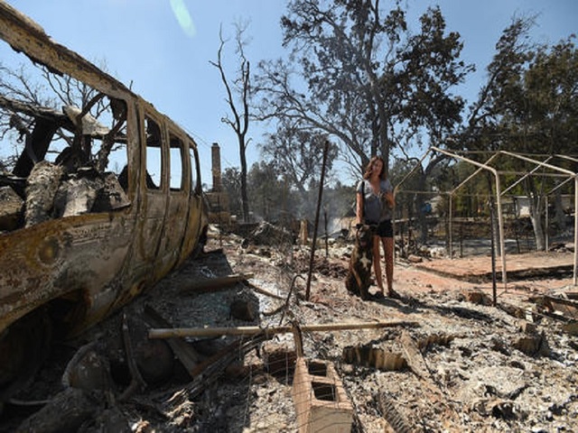 Man arrested for sparking fire that destroyed Calif. town