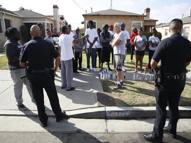 Activists search for answers in fatal police shooting