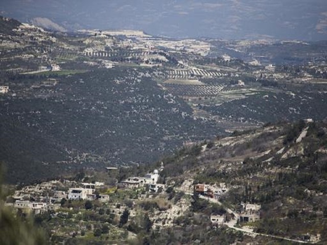 At least 20 killed near Turkey border, Syrian activists say