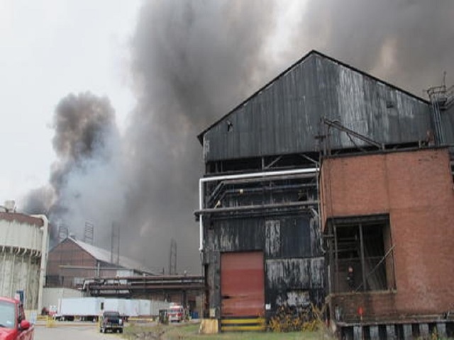 Hot bulb hitting cardboard sparked massive NY fire, official says