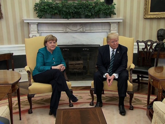 Trump says he has something in common with Merkel, insinuates wire tapping claim