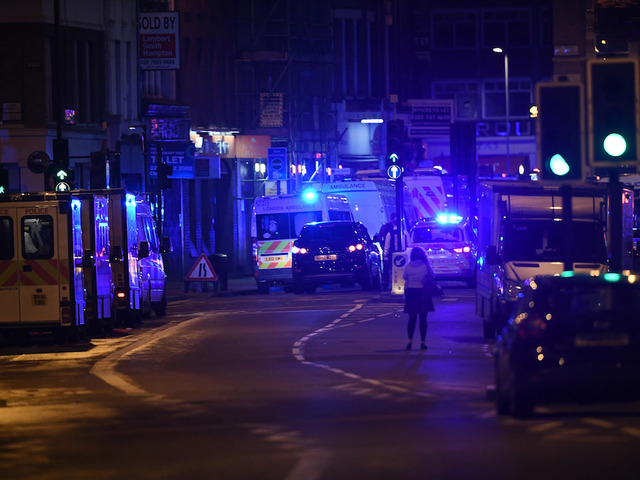 Police officer tackled attackers 'armed only with baton'
