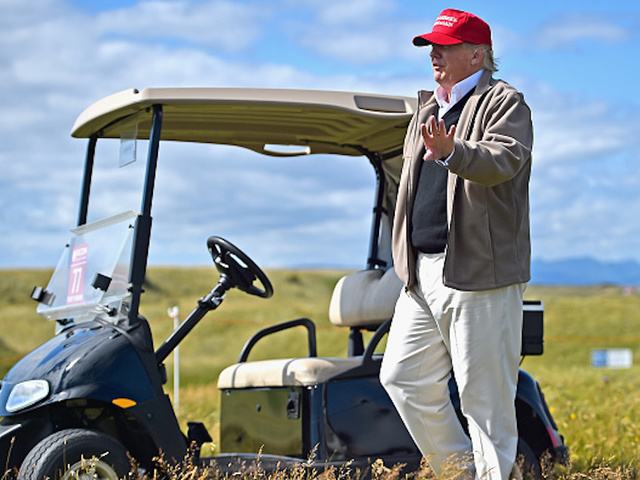 Truck blocks cameras from filming Trump on golf course