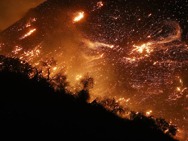 California fires: 'Firefighters taking a beating' as Santa Ana winds stoke blazes