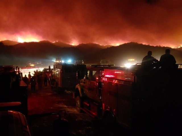 Wildfires bring orange skies, ash to parts of Northern California