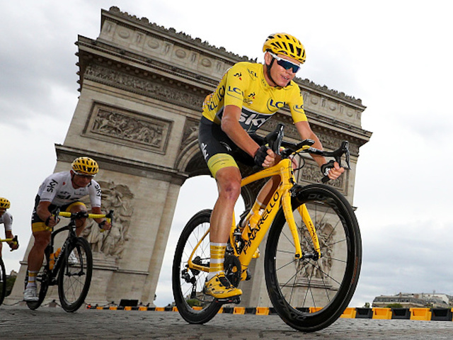 Tour de France rider crashes when accosted by police officer after race
