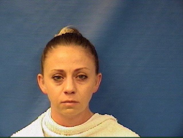 Dallas police officer realized she was in the wrong apartment when she turned on the lights