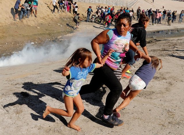 US arrests 42 migrants who rushed the Mexico-US border, patrol agent says